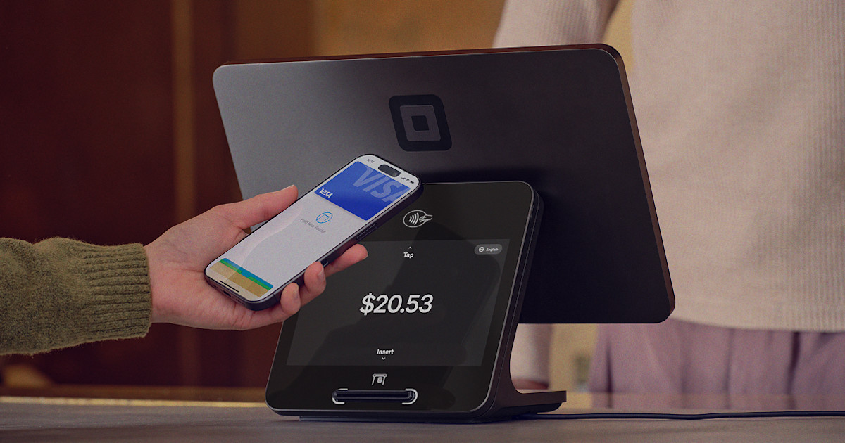 Square Register with a customer tapping their phone to pay